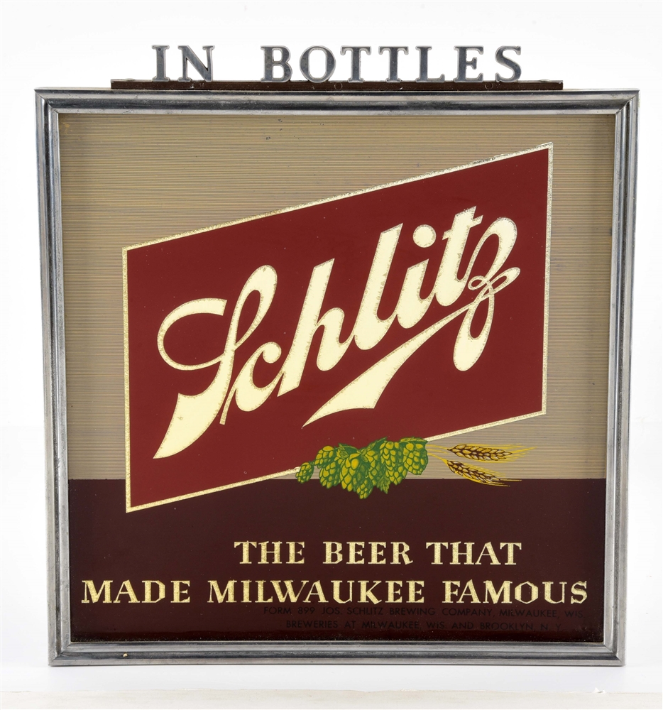 FRAMED SCHLITZ "THE BEER THAT MADE MILWAUKEE FAMOUS" SIGN.