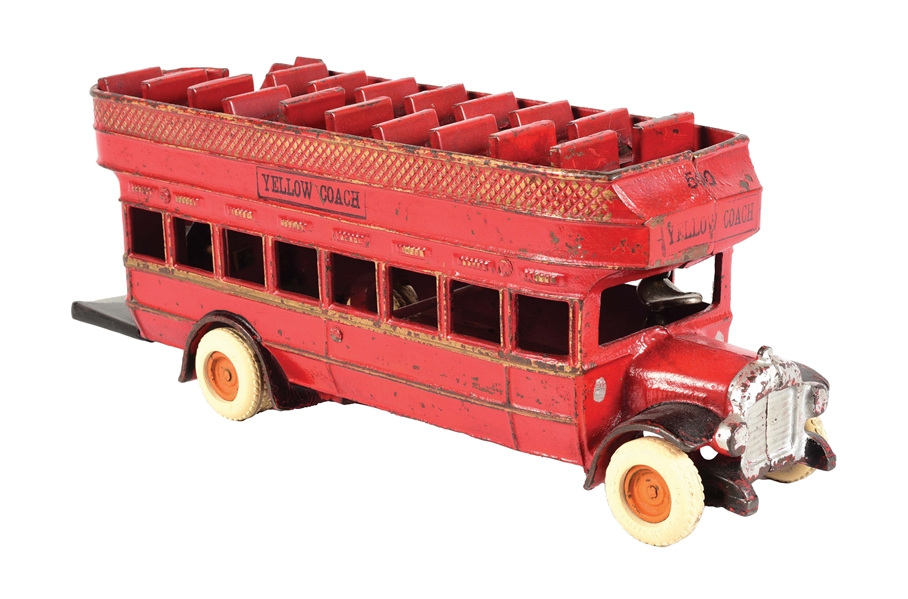 CAST IRON YELLOW COACH TOY BUS.