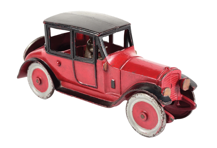 CAST IRON ARCADE TOY CAR WITH DRIVER.