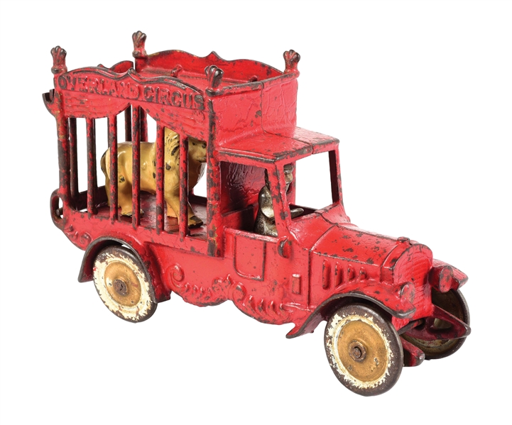 CAST IRON OVERLAND CIRCUS TRUCK WITH DRIVER & LION.