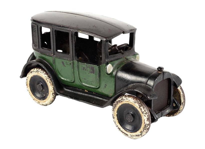 CAST IRON BLACK AND GREEN TOWN CAR.