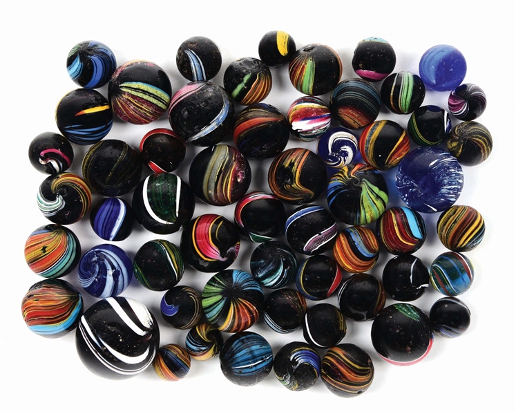 LOT OF APPROXIMATELY 56 INDIAN SWIRL MARBLES.