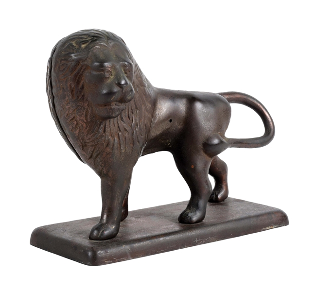 RARE CANADIAN CAST IRON LION STILL COIN BANK ON BASE.