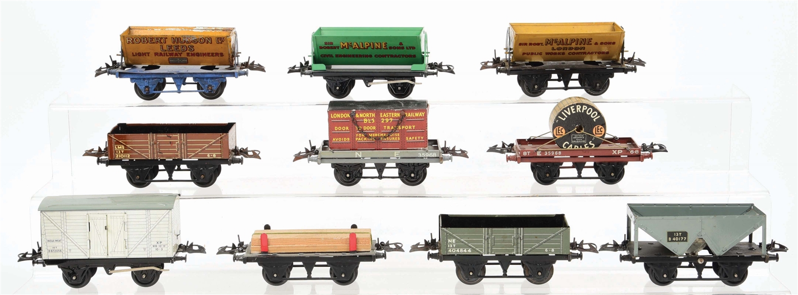 LOT OF 10: "O" GAUGE ASSORTED HORNBY TRAIN CARS.