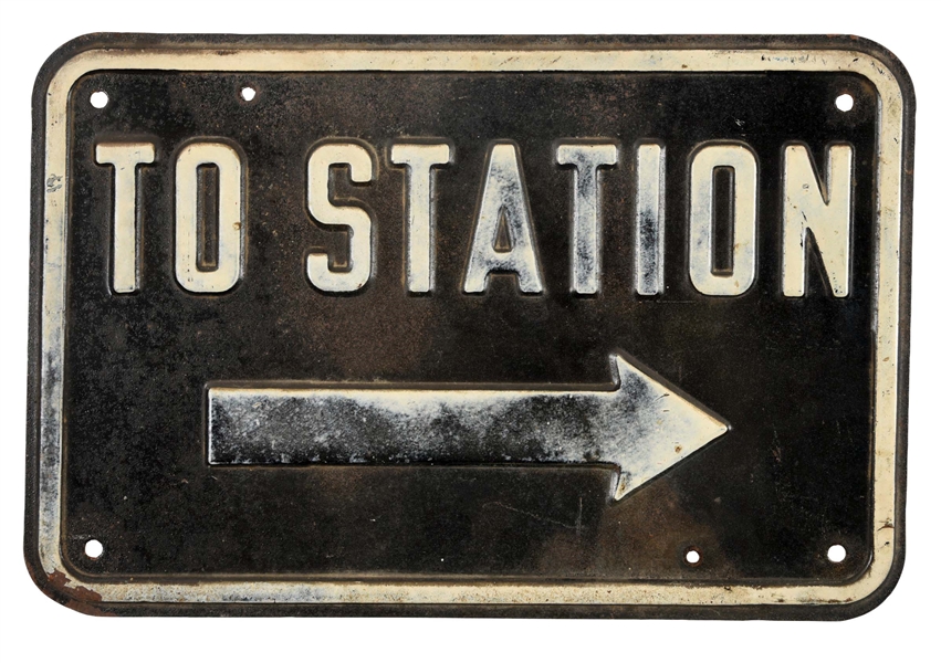 "TO STATION" PAINTED METAL RAIL ROAD SIGN.