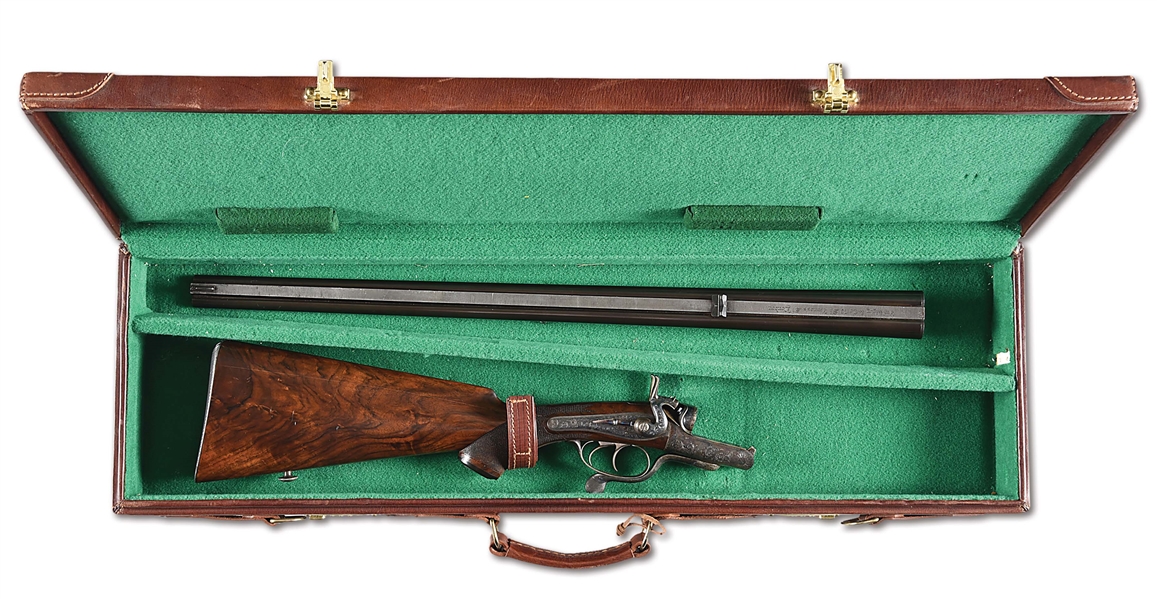 (C) RIGBY HAMMER FIRED DOUBLE RIFLE IN .303 BRITISH, CASED.