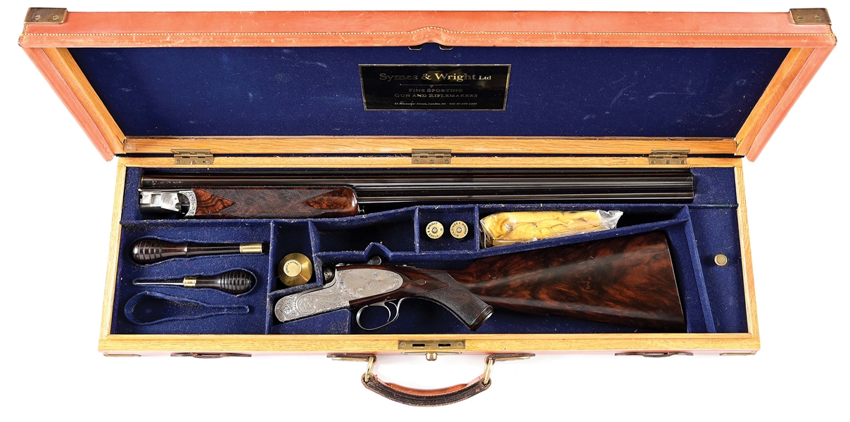 (M) A MASTERPIECE OF ENGRAVING, "THE BIRDS OF PREY GUN", A SYMES AND WRIGHT ENGRAVED BY THE LEGENDARY RASHID EL HADI, 12 GAUGE OVER/UNDER SHOTGUN IN CASE.