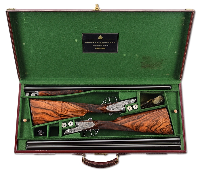 (M) DELUXE PAIR OF HOLLAND & HOLLAND 12 GAUGE SIDE BY SIDE SLE ROYALS WITH GAME SCENES SIGNED BY KEN HUNT, IN MAKER CASE.