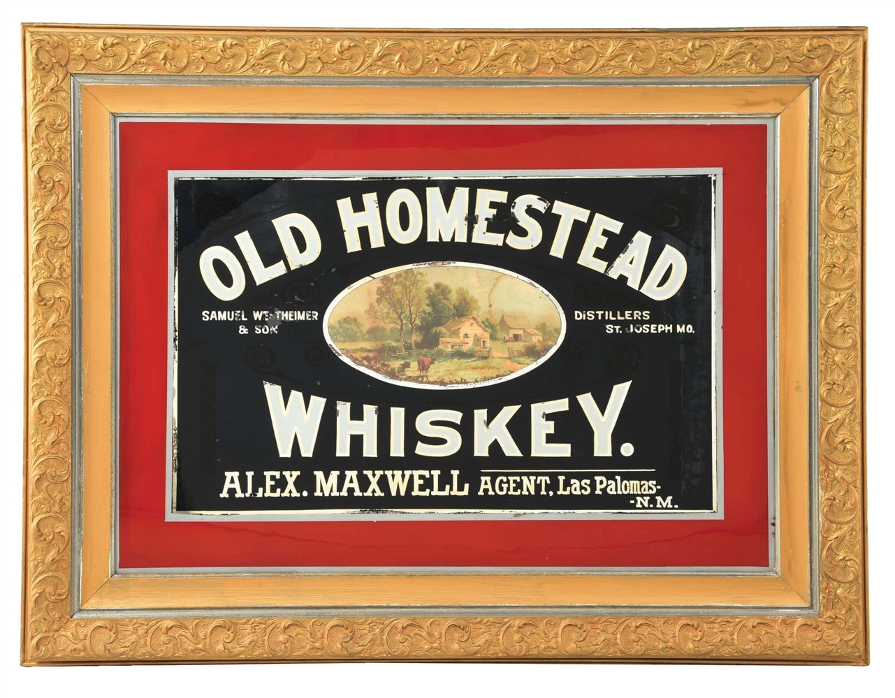 FRAMED OLD HOMESTEAD WHISKEY REVERSE PAINTED GLASS ADVERTISEMENT.