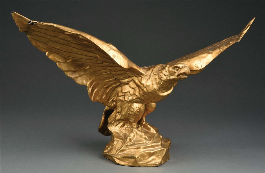 GOLD PAINTED TIN EAGLE STATUE.