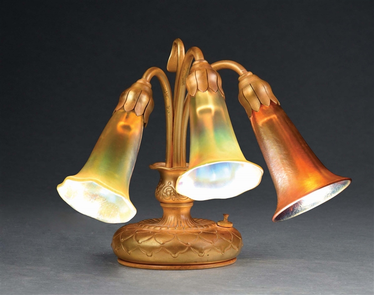 TIFFANY 3-LIGHT LILY LAMP W/ ART GLASS SHADES.