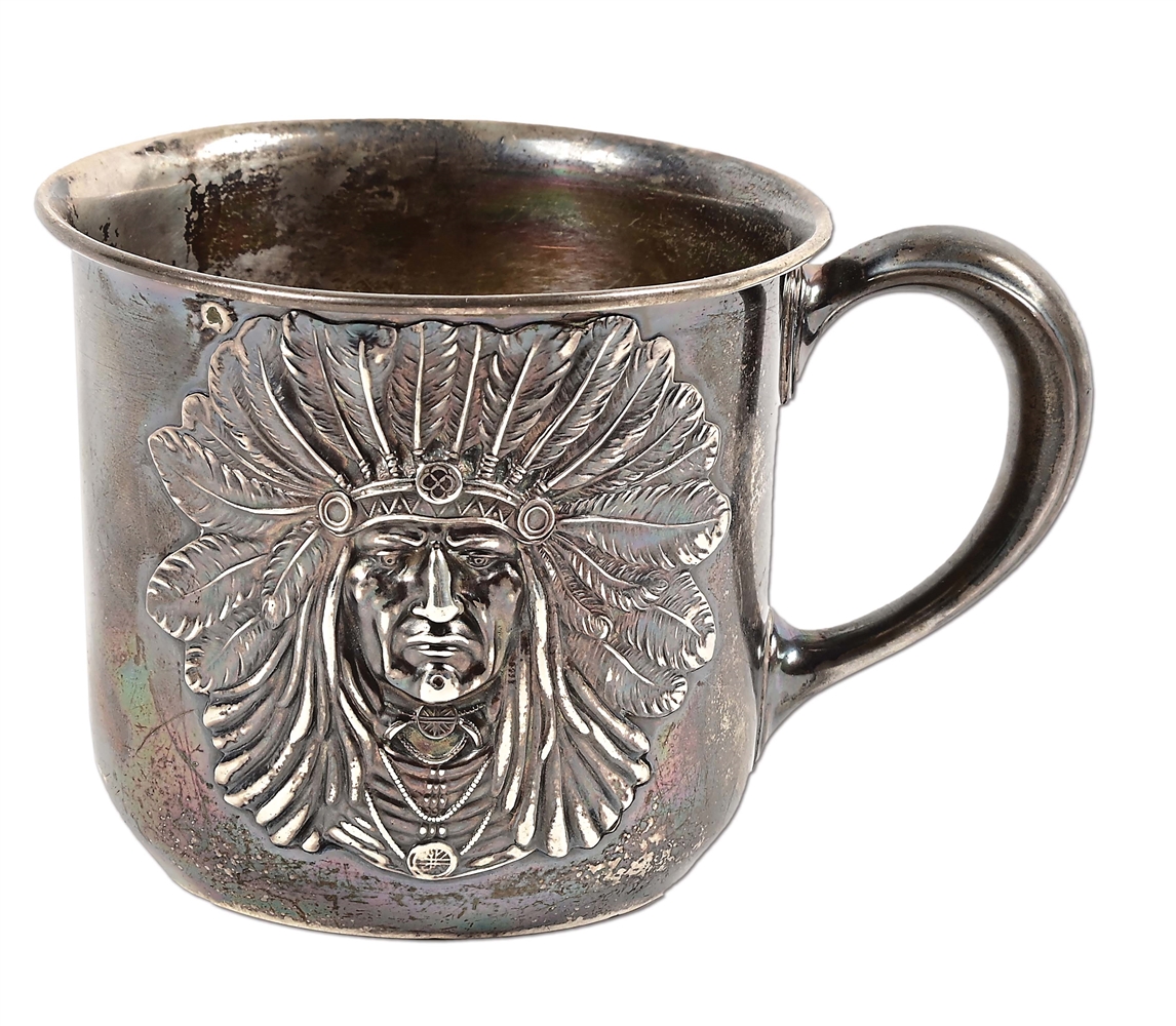 SILVER CUP WITH INDIAN CHIEF MOTIF.