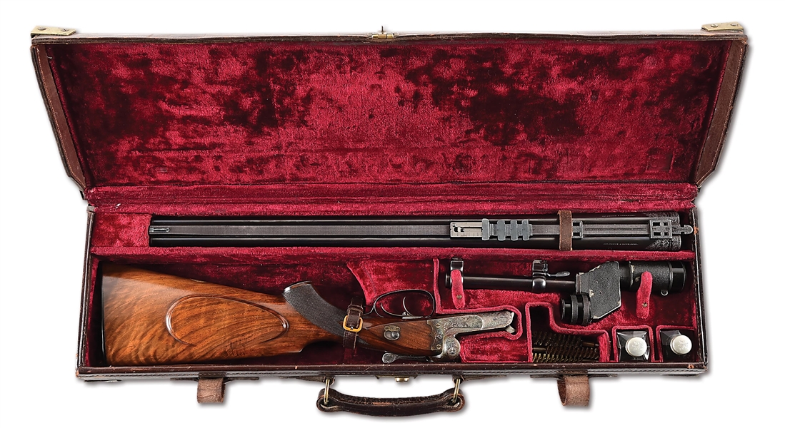 (C) J.P. SAUER 10.75X68 DOUBLE RIFLE, RETAILED BY VOELKER, BUENOS AIRES, AND ENGRAVED WITH SAFARI SCENES OF LIONS, ELEPHANTS, AND TIGERS.