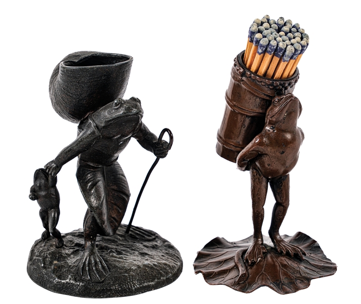A PAIR OF FIGURAL BRONZE MATCH HOLDERS