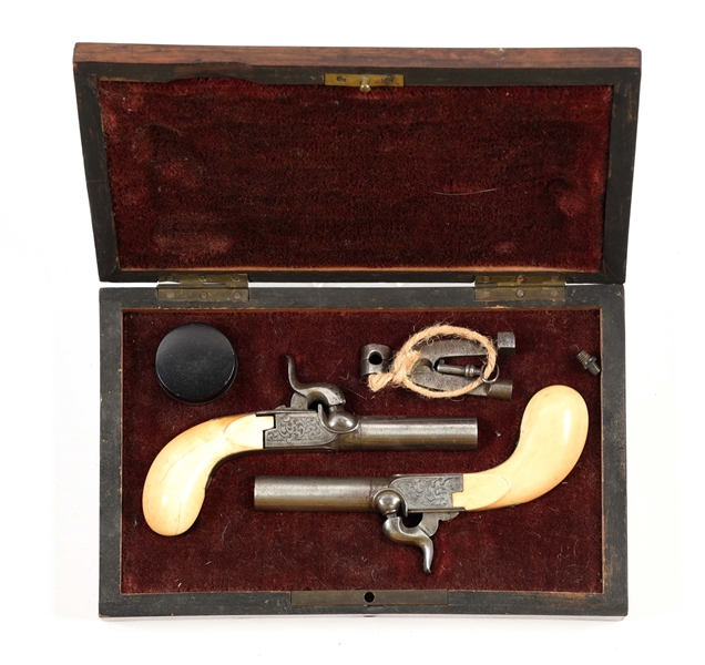 (A) CASED PAIR OF BELGIAN PERCUSSION MUFF PISTOLS.