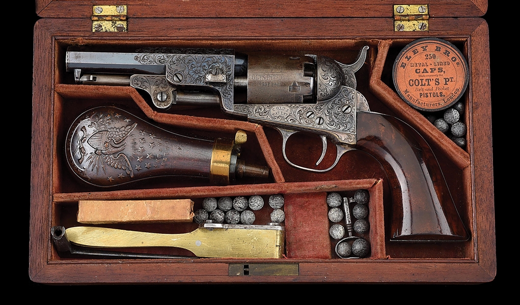 (A) ENGRAVED COLT MODEL 1849 POCKET PERCUSSION REVOLVER IN COLT PARTITIONED CASE.