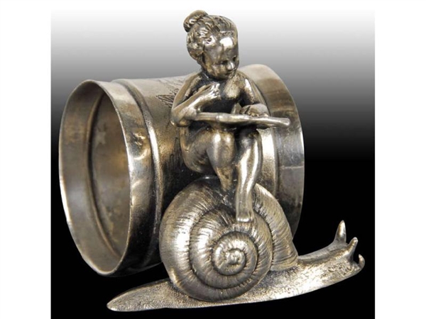 YOUNG GIRL READING BOOK SITTING ON SNAIL FIGURAL N