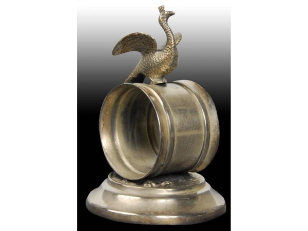 PEACOCK WITH SPREAD WINGS FIGURAL NAPKIN RING.    