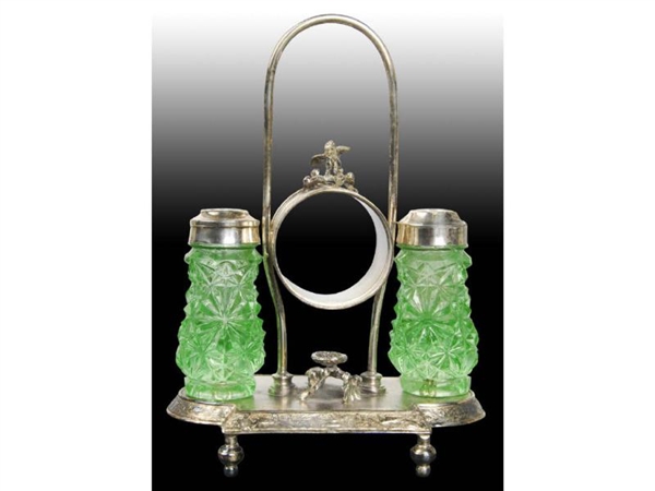 NAPKIN HOLDER WITH GREEN GLASS SHAKERS.           