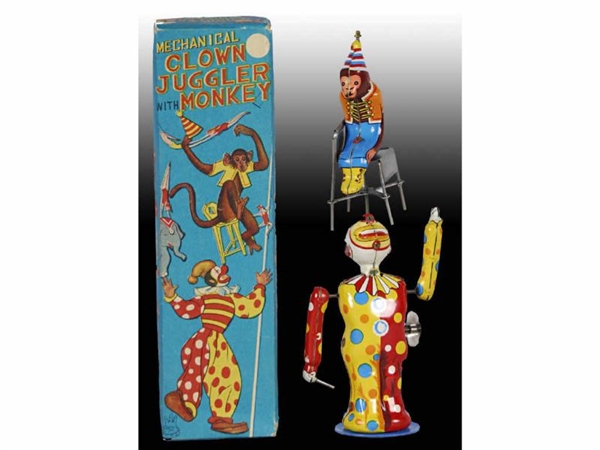 JAPANESE TPS TIN WIND-UP CLOWN JUGGLING MONKEY TOY