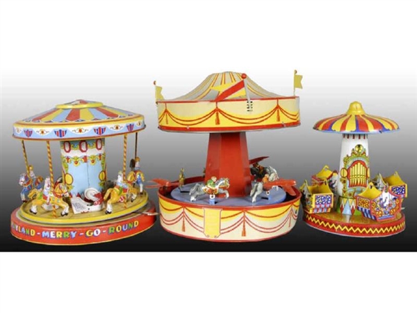 LOT OF 3: AMERICAN TIN MERRY-GO-ROUND TOYS.       