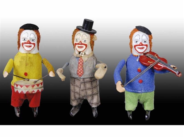 LOT OF 3: SCHUCO WIND-UP CLOWN TOYS.              