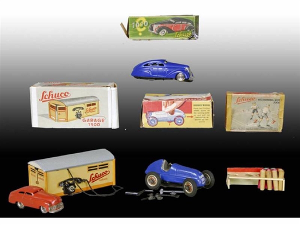 LOT OF 4: SCHUCO TOYS WITH ORIGINAL BOXES.        