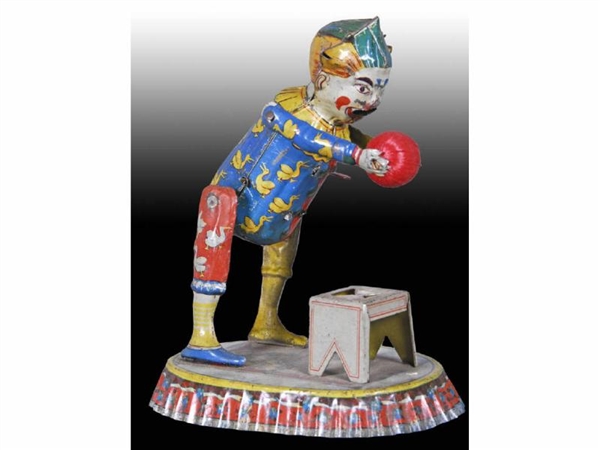 GERMAN TIN WIND-UP FISHER CLOWN TOY.              