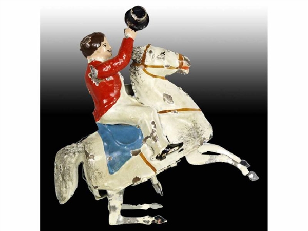 GERMAN TIN WIND-UP HAND-PAINTED MAN RIDING HORSE T