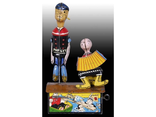 POPEYE & OLIVE OYL WIND-UP JIGGERS ROOF TOY.      
