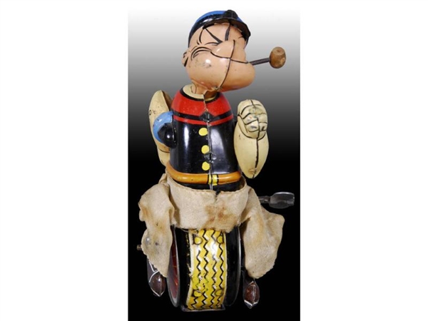 LINEMAR TIN WIND-UP POPEYE ON UNICYCLE TOY.       