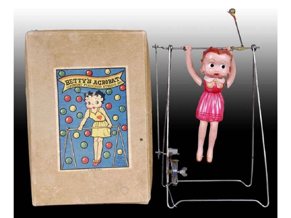 ACROBAT BETTY BOOP CELLULOID WIND-UP TRAPEZE TOY W