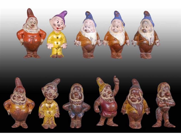 LOT OF 11: ASSORTED SNOW WHITE DWARFS FROM 1938.  