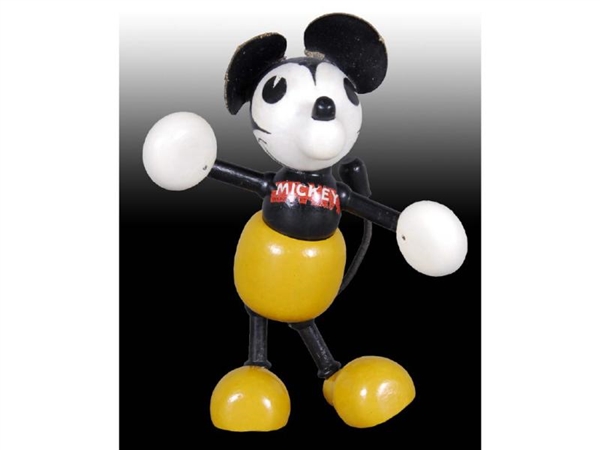 YELLOW MICKEY MOUSE FIGURE WITH LOLLIPOP HANDS.   