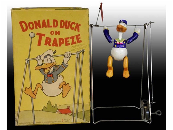 WALT DISNEY CELLULOID DONALD DUCK TRAPEZE TOY WITH