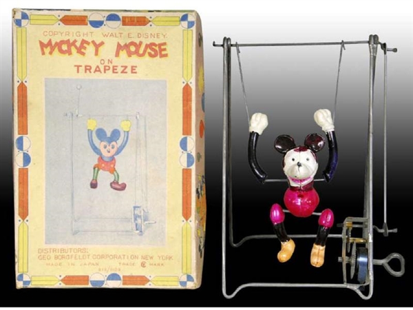 CELLULOID WIND-UP MICKEY MOUSE TRAPEZE TOY WITH OR