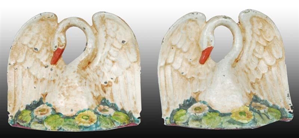 SWAN CAST IRON BOOKENDS.                          