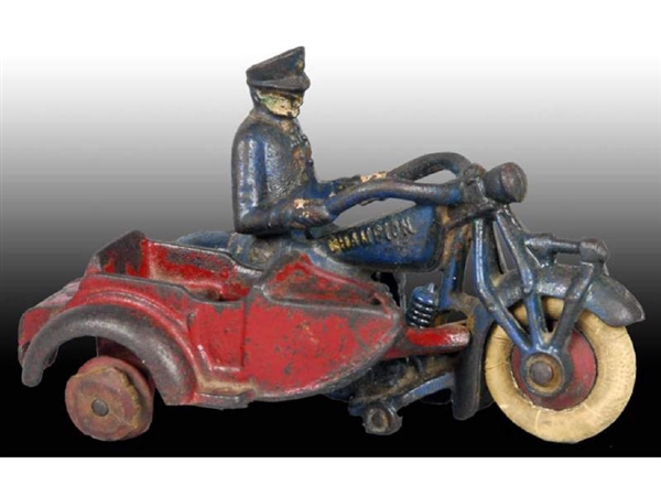CAST IRON CHAMPION TOY MOTORCYCLE WITH SIDECAR.   