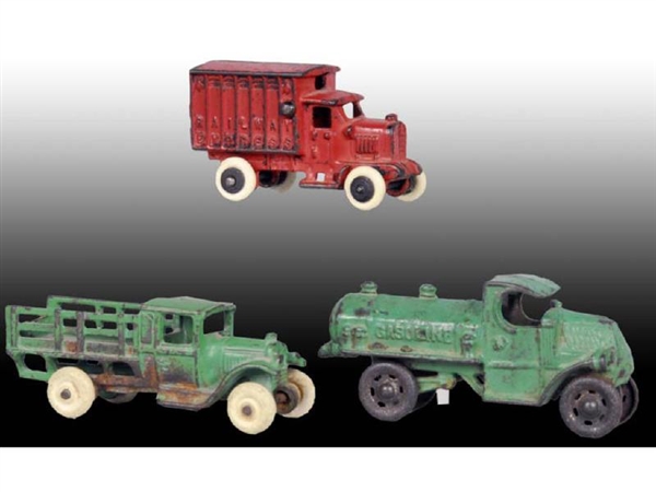 LOT OF 3: SMALL CAST IRON TRUCK TOYS.             