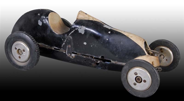 EARLY GAS POWERED RACE CAR TOY.                   