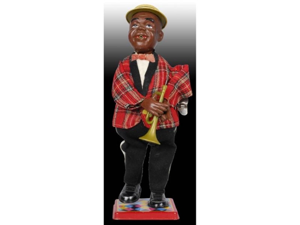 JAPANESE WIND-UP TRUMPET PLAYER TOY WITH BOX.     