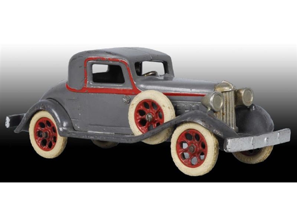 CAST IRON ARCADE REO COUPE TOY CAR.               