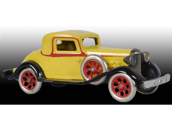 CAST IRON ARCADE REO COUPE TOY CAR.               