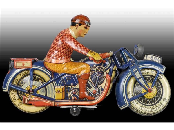 GERMAN TIPPCO TIN TOY MOTORCYCLE.                 