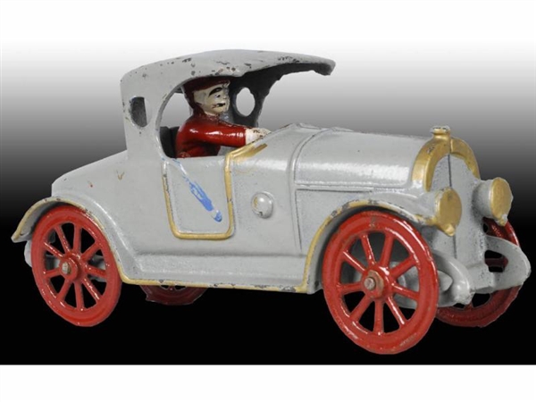 EARLY CAST IRON HUBLEY ROADSTER CAR TOY.          