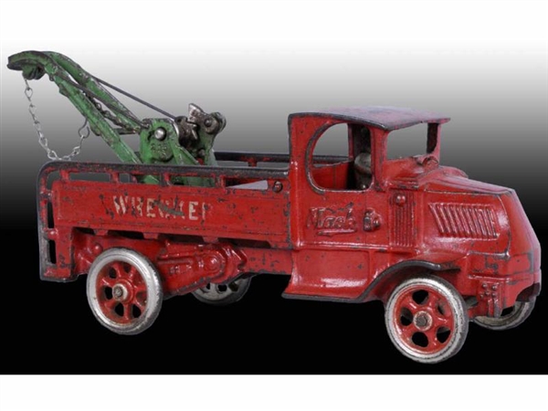 LARGE RED CAST IRON ARCADE MACK TRUCK TOY.        