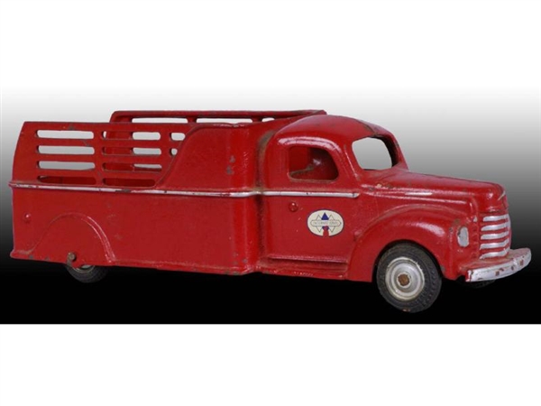 RED CAST IRON ARCADE INTL STAKE TRUCK TOY.       