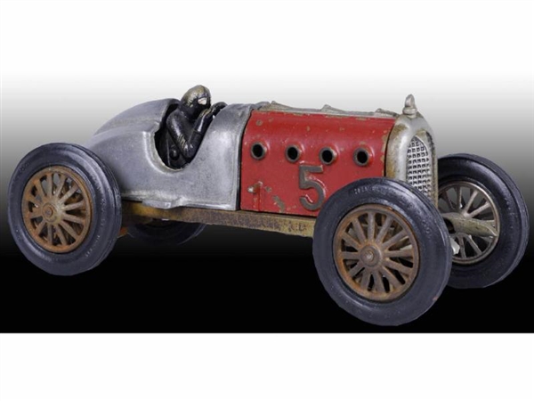 CAST IRON HUBLEY RED DEVIL RACER CAR TOY.         