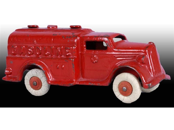 CAST IRON AC WILLIAMS RED GASOLINE TRUCK TOY.     
