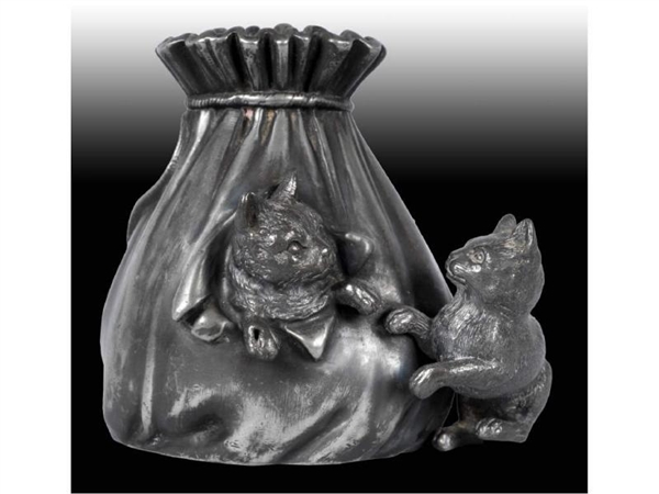 GERMAN SILVER PLATED CATS IN BAG STILL BANK.      